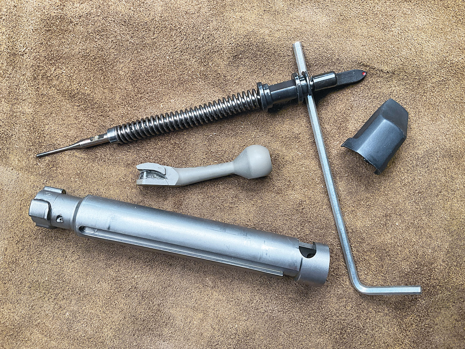 The bolt can be field stripped in seconds with anything the size of a 16-penny nail.